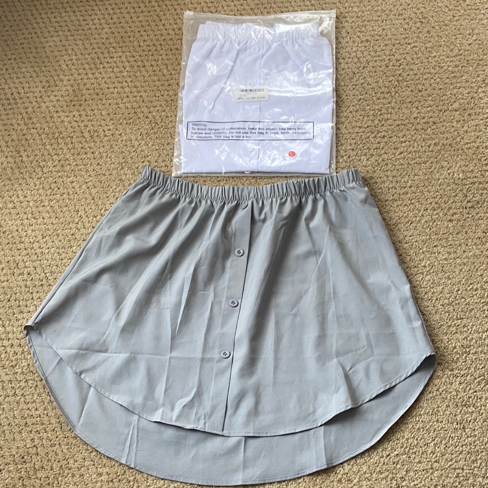 2 Shirt extensions in White and Gray Brand New. Wear under cropped sweaters